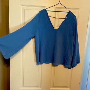 Lush blue top with open back
